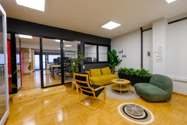 Open-plan shared office space with natural light